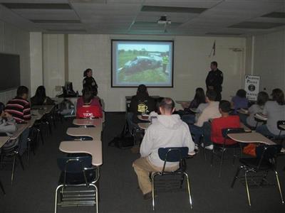 Traffic Unit teaches a Palatine High School class about roadway safety.