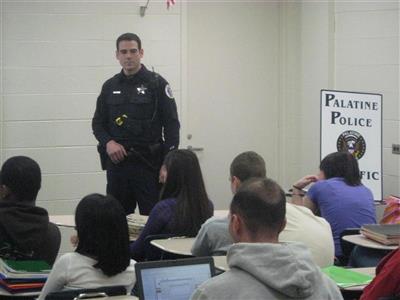 Traffic Unit teaches a Palatine High School class about roadway safety.