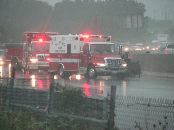 Station 84 and 85 units work a rollover crash on Route 53 during a rain storm.