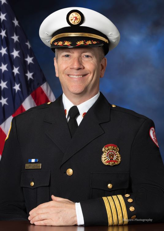headshot of a white male fire chief in formal fire dress attire